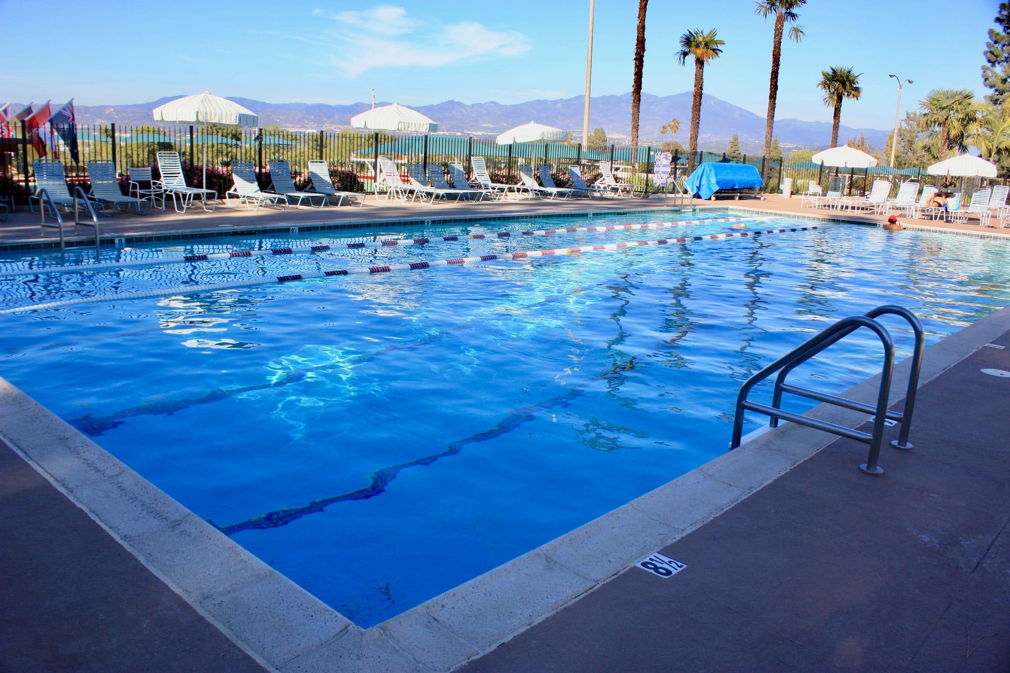 Resort-style lap pool at Laguna Woods Village with mountain views